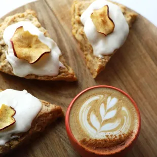 a cup of coffee and three pieces of bread