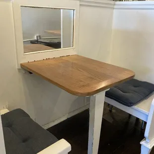 Adorable seating for two, perfect for a relaxing convo.