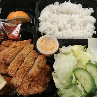 Tonkatsu bento - 1 piece of pork was tough but the other piece tasted good. The lettuce and cucumber for salad were v fresh.