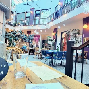 The "Atrium" mid day. Bright and spacious above. Not pictured is a salon behind the stairwell.