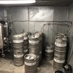 a row of beer kegs
