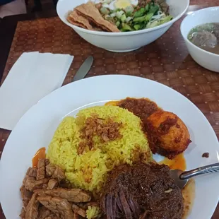 Yellow rice combo with beef rendang and tempah