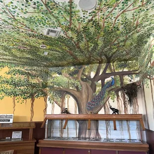 Beautiful artwork on the wall and ceiling