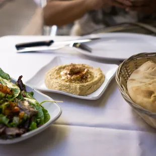 Pita and hummus with side salad