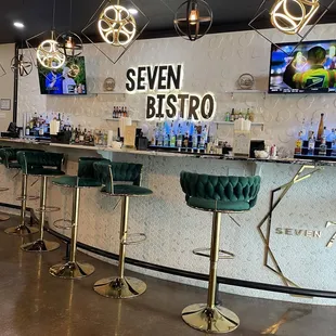 Bar area, dynamic seating, urban-chic and sophistication of the establishment. Sexy ambience and club-like settings with a broad food menu.