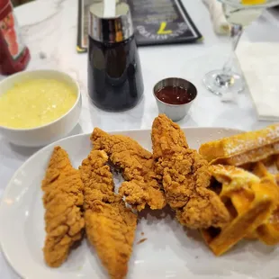 a plate of fried chicken and waffles