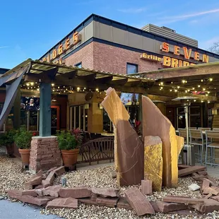 a giraffe statue in front of a restaurant