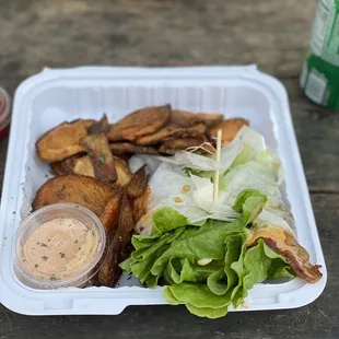 Protein style cheese burger with fries.
