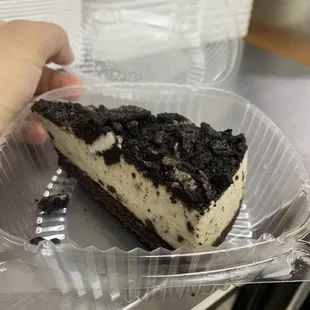 a slice of oreo cheesecake