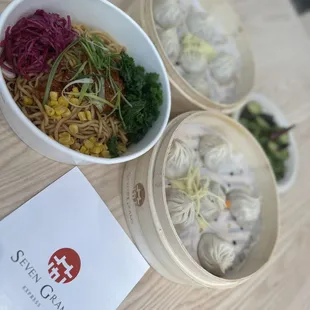  three bowls of food on a table