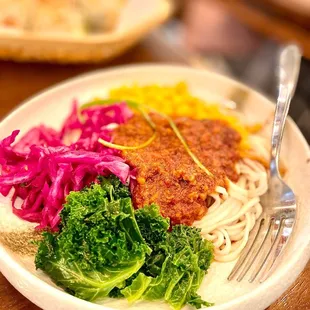Spicy pork paste over noodles