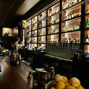 a bar filled with bottles of liquor