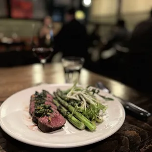 Lamb w/asparagus, artichoke hearts, peas and sauce. 10/10 recommend!