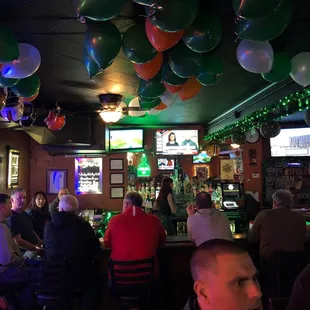 people sitting at the bar