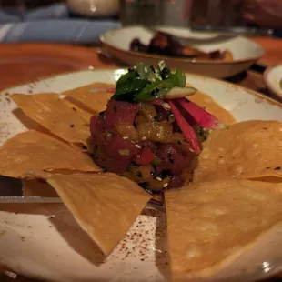 a plate of food with tortillas