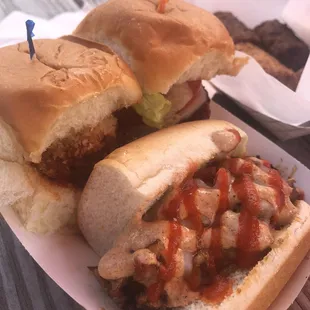 a sandwich with meat and tomato sauce