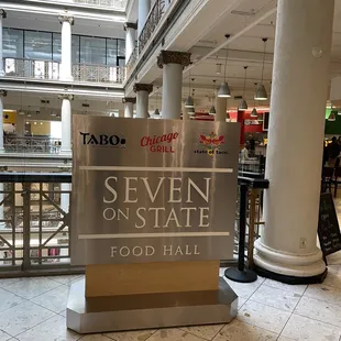 a sign in a shopping mall