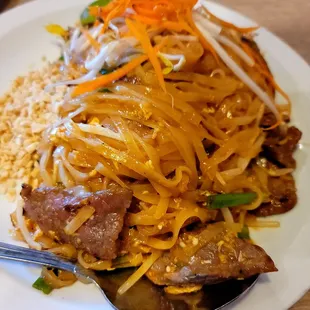 #81 PAD THAI (price depends on the protein... we got beef so ours was 11.95)