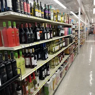 rows of wine bottles on shelves