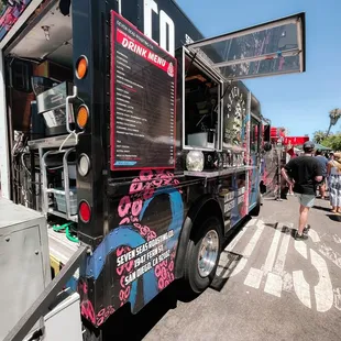 a food truck parked on the side of the road