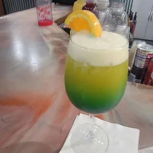 a green and orange drink