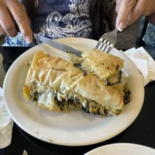 Spanakopita partly eaten