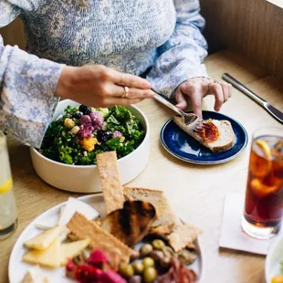 a woman eating a salad