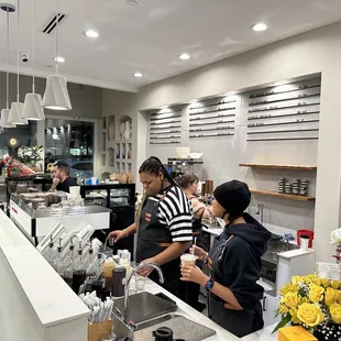 a group of people in a coffee shop