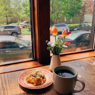 a cup of coffee and a plate of pastries