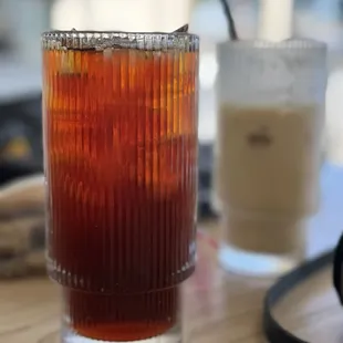 a tall glass of iced coffee