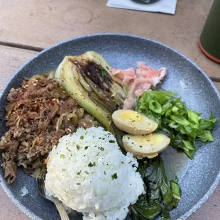 a plate of food on a picnic table