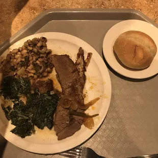 Brisket Dinner with Black Eyed Peas and Creamed Kale...dinner roll is complimentary