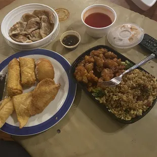 General Tso w/ pork fried rice. Egg rolls. Crab Rangoon. Fried shrimp. Best damn dumplings and biscuits