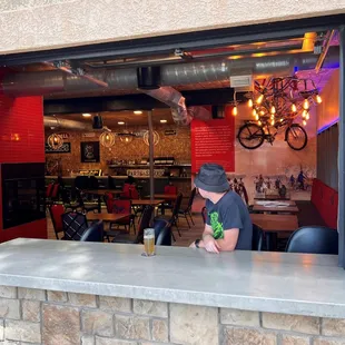 a man sitting at a bar