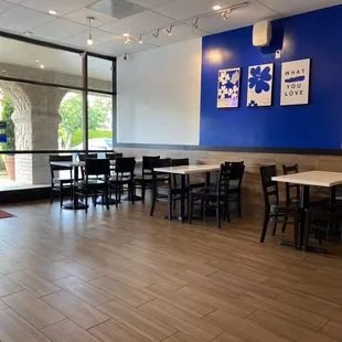 a restaurant with tables and chairs