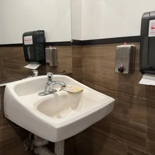 Little rubber ducky guy making sure you wash your hands in restroom.