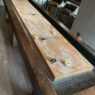 a shuffler table in the middle of a room