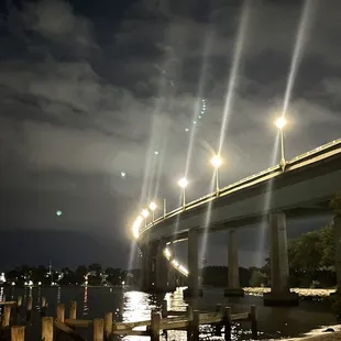 a bridge over a river at night