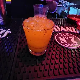 a person pouring a drink