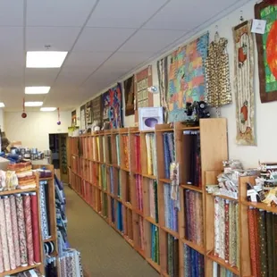 Fabrics Galore! We have been known to have the hard to find layer cakes, jelly rolls and fabric blocks you've been searching for