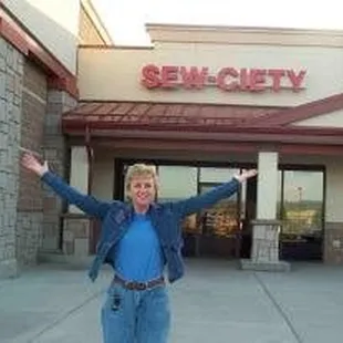 Carol in front of Sew-ciety in Castle Rock, Colorado