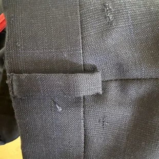 Upper rear of suit pants.