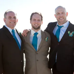 Lee altered the suit in the middle and made the butterfly boutonnieres from scratch!