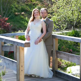 She hemmed my dress, did the bustle, and shortened the shoulder straps. She also fixed my bra/slip so I could actually get in it!
