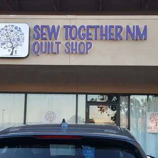 Sew Together Quilt Shop exterior sign.