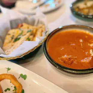 Garlic Cheese Naan $6.25; Chicken Tikka masala $15.99