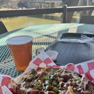 Loaded baked potato and an IPA