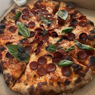 Ezzo pepperoni with basil and hot honey on the side