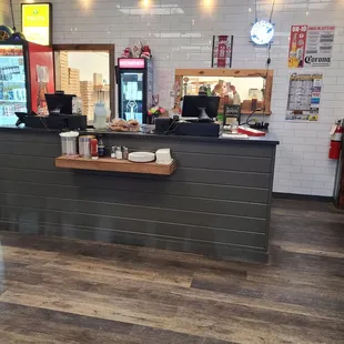 Register, there are 7 tables inside 2 are high tops