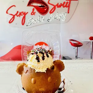 a cupcake in a plastic container